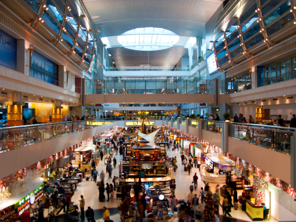 A photo of inside a shopping centre with shops.