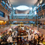 A photo of inside a shopping centre with shops.